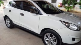 Selling White Hyundai Tucson 2011 M/T Gasoline Still Negotiable