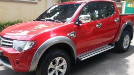 Red Mitsubishi Strada 2012 Truck for sale in Talisay City