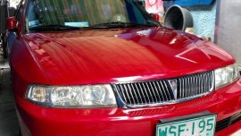 Red Mitsubishi Lancer 2001 for sale in Quezon City