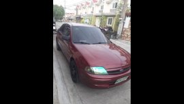 Sell Red 2001 Ford Lynx Sedan in Mabalacat
