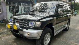 Black Mitsubishi Pajero 2004 SUV / MPV at Automatic  for sale in Manila