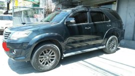 Black Toyota Fortuner 2014 SUV / MPV for sale in Manila