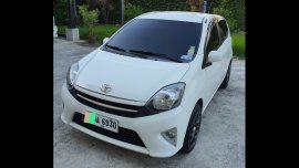 Sell White 2015 Toyota Wigo in Cavite City