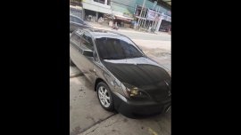 Black Mitsubishi Lancer 2008 for sale in Malolos City