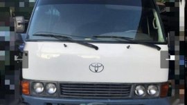 White Toyota Coaster 1998 for sale in Manila