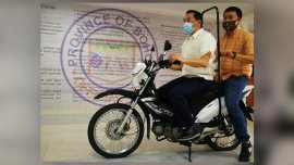 Is it safe to add a barrier on motorcycles for social distancing?   