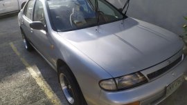 Silver Nissan Almera for sale in Manila