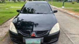 Black Mitsubishi Lancer for sale in Rosario