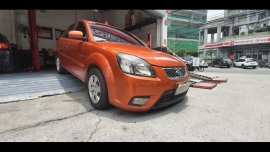 Selling Orange Kia Rio 2010 Sedan in Manila