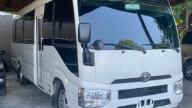 White Toyota Coaster for sale in Manila