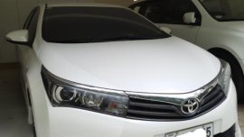 Pearl White Toyota Corolla altis for sale in Manila