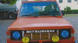 Selling Orange Mitsubishi Pajero for sale in Bustos