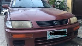 Sell Purple Mazda Familia in Caloocan