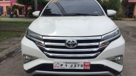 Selling White Toyota Rush for sale in Manila