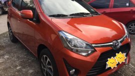 Selling Orange Toyota Wigo in Dasmariñas