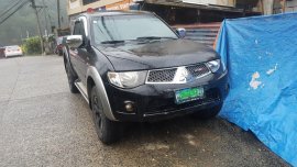 Black Mitsubishi Strada 2013 for sale in Baguio City