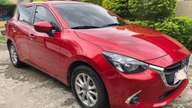 Red Mazda 2 for sale in Pacita Complex