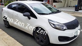Sell White Kia Rio in Quezon City