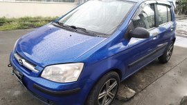 Selling Blue Hyundai Getz in Lemery