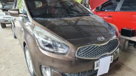 Brown Kia Carens for sale in Butuan