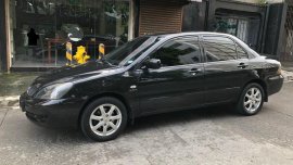Selling Black Mitsubishi Lancer 2012 in Mandaluyong