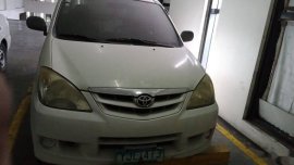 White Toyota Avanza 2010 for sale in Quezon City