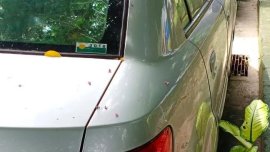 Selling White Kia Rio in Quezon City