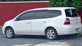 Selling White Nissan Livina in Manila