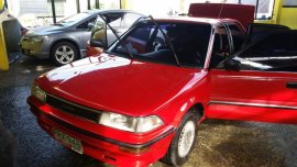 Selling Red Toyota Corolla in Quezon City