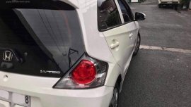 Selling White Honda Brio in Cainta