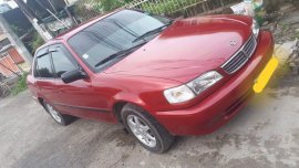 Sell Red Toyota Corolla in Quezon City
