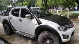 2010 MITSUBISHI STRADA MT