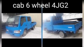 Blue Isuzu Elf for sale in Manila