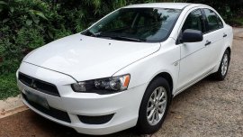 Selling White Mitsubishi Lancer ex in Taguig