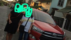 Selling Red Toyota Innova in Manila
