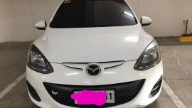 Selling White Mazda 2 in Manila
