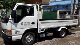Sell White Isuzu Elf in Manila