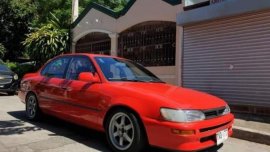 Selling Red Toyota Corolla in Quezon City