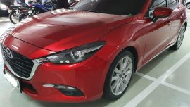 Sell Red Mazda 2 in Quezon City