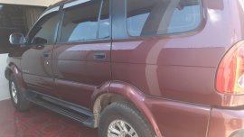 Dark Red Isuzu Sportivo 2012 at a good price for sale in Tagum