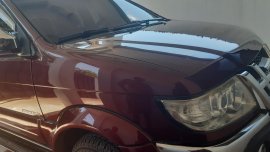 Dark Red Isuzu Sportivo 2012 at good price for sale in Tagum City