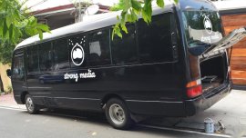 Selling Black Toyota Coaster in Quezon City