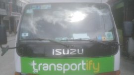 White Isuzu Elf for sale in Manila