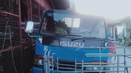 Blue Isuzu Elf for sale in Morong