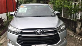 SILVER METALLIC TOYOTA INNOVA 2.8 E M/T 2018 with Franchise and Airport Sticker 