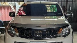 Sell White 2018 Mitsubishi Strada in General Trias