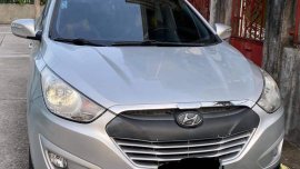 Selling Brightsilver Hyundai Tucson 2012 in Cavite