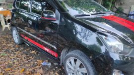 Selling Black Toyota Wigo 2014 in Cabuyao