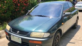 Blue Mazda Familia for sale in Muntinlupa