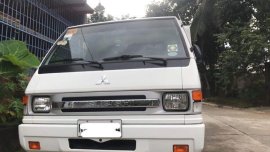 Selling White Mitsubishi L300 in San Jose del Monte